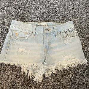 Barely worn sequined pocket light distressed jean shorts